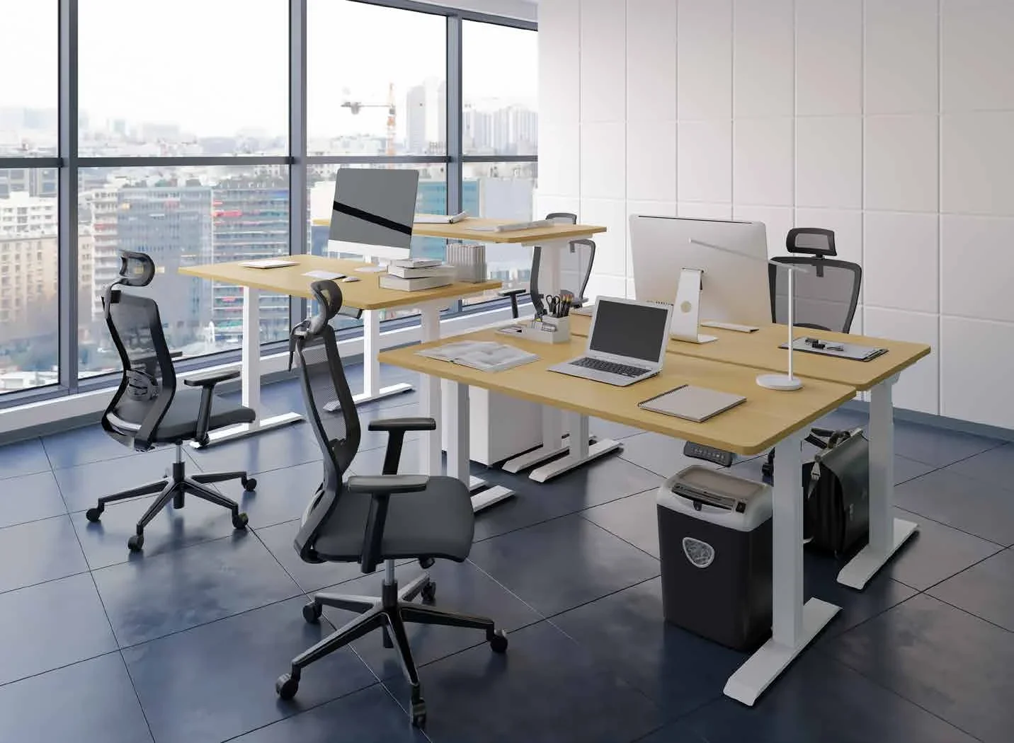 FlexiSpot E7. Open-plan office with three white-frame desks with oak-look tops, mesh chairs, monitors and laptops, grey tiled floor and a city view through floor-to-ceiling windows.